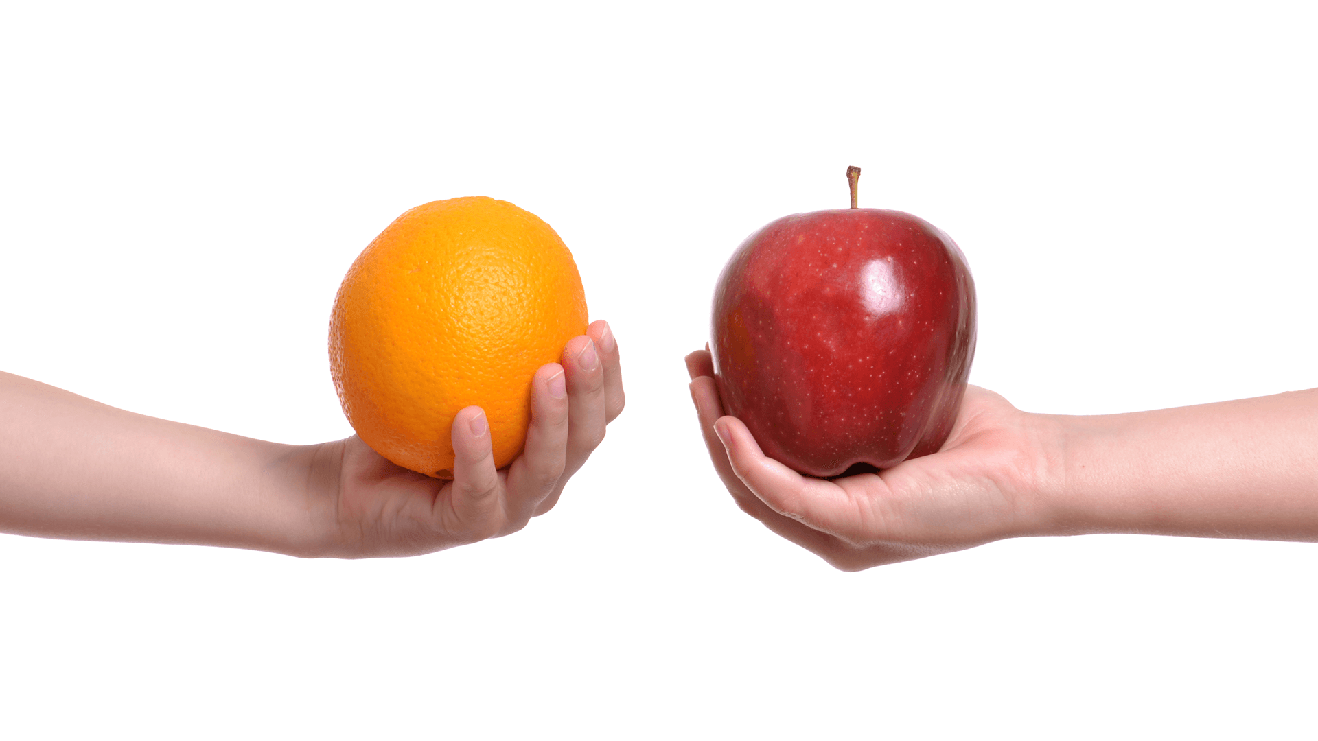 Two hands holding an apple and an orange in comparison.